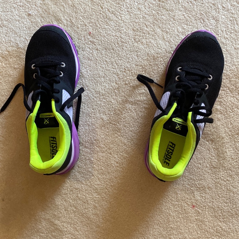 Nike  Running Shoes Size 8.5 Never worn outside Practically new BL PURPLE GREEN